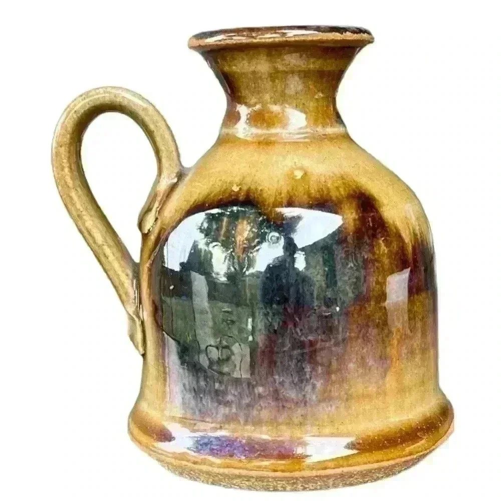 MCM signed Olson luster glazed earthenware bottle candle holder with handle